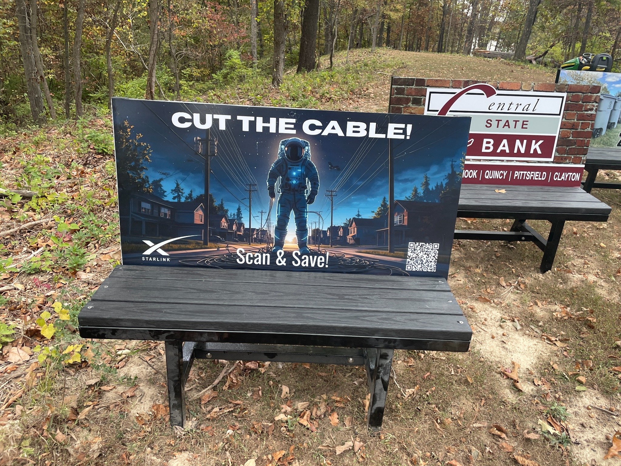A Benchboards advertisement installed in a community